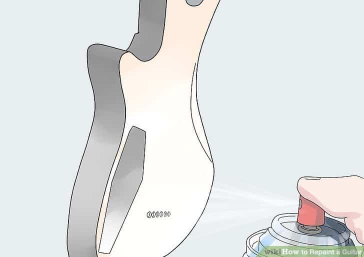 Applying primer on the guitar