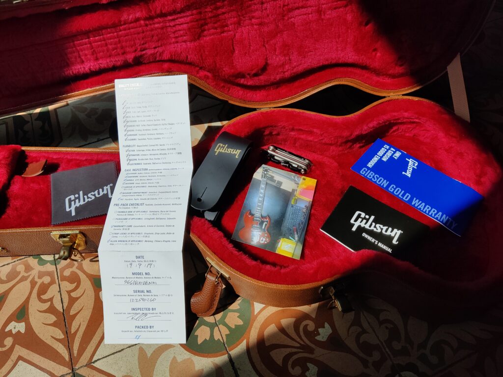 Contents of the Gibson SG Standard '61 Maestro Vibrola hardshell case
