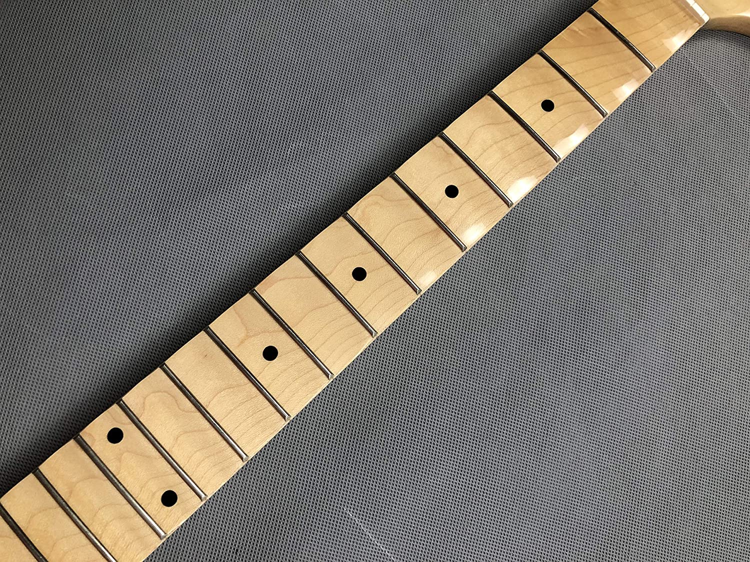 Fretboards scallop