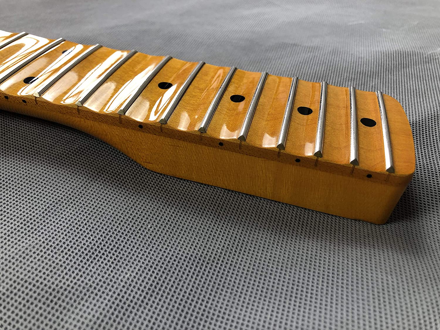 What is a Scalloped Fretboard