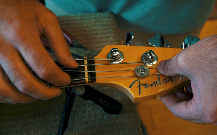 restringing bass guitar