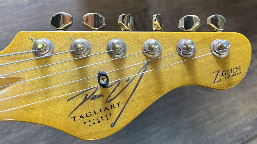 guitar tiners inspect buying new guitar